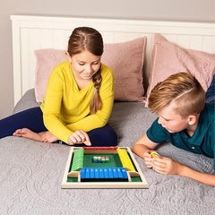 Billowvolve Shut The Box green felt mat reduces noise during play.