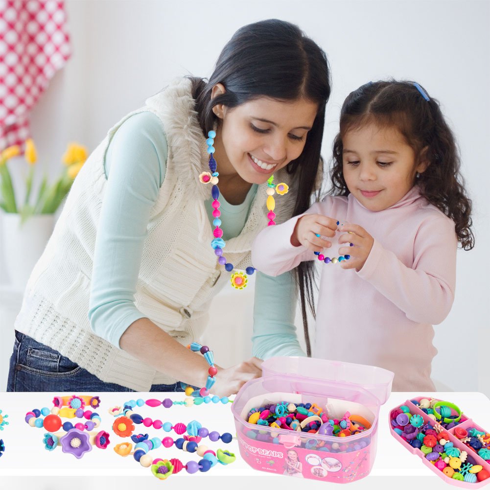 Biranco Pop Beads crafting session with friends encourages imaginative play.