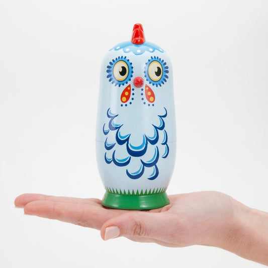 Bits and Pieces chicken nesting dolls inner chick eggs, colorful interior for playful display.