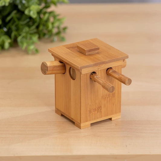 Bits and Pieces hidden compartment box stores small treasures securely.