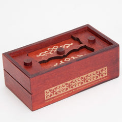 Bits and Pieces Secret Money Puzzle Box open to reveal hidden compartment