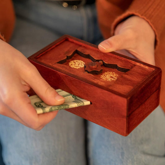 Bits and Pieces Secret Money Puzzle Box open compartment reveals hidden stash safely