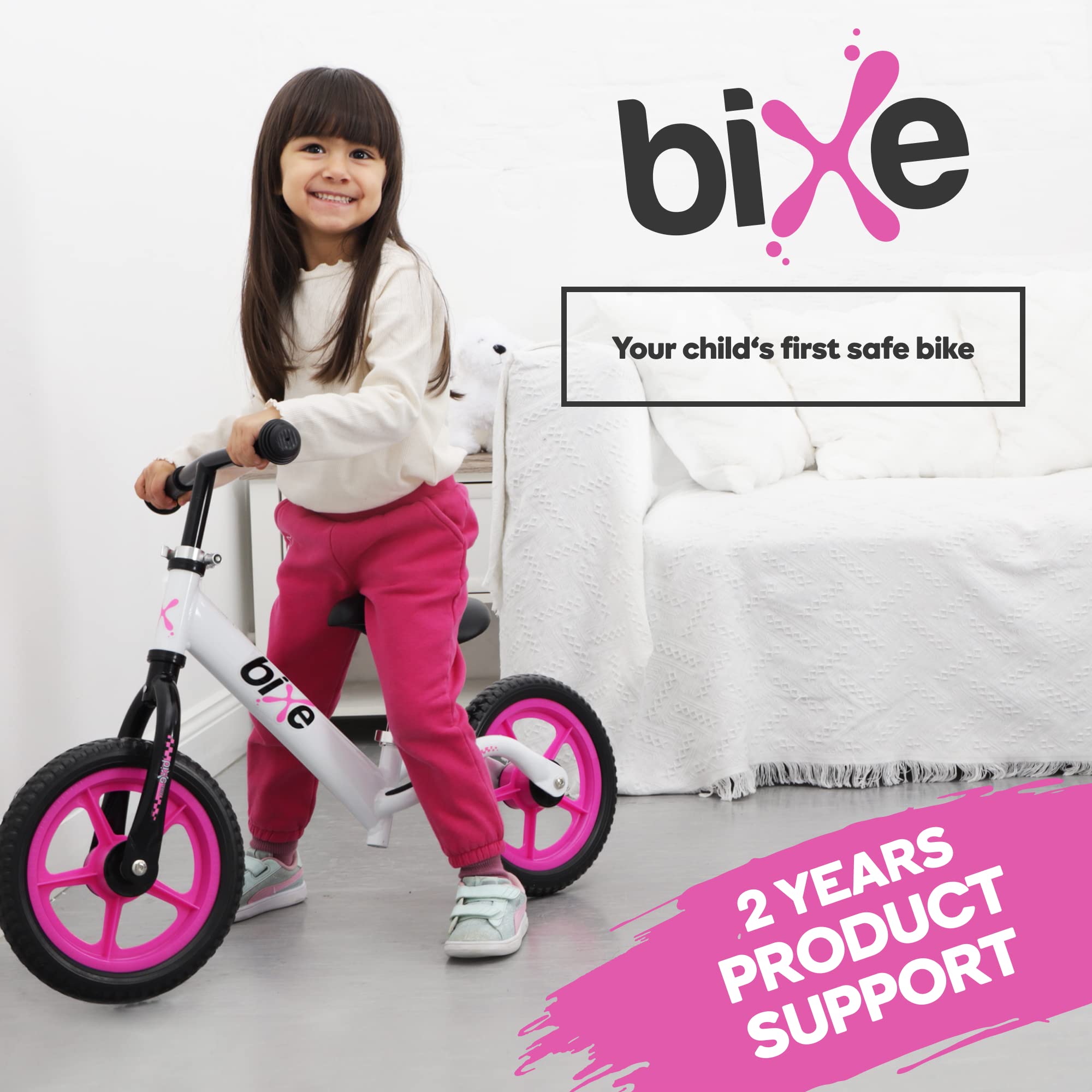 Bixe pink back view balance bike shows compact storage after use.