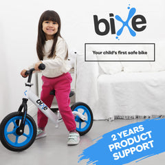 Bixe balance bike blue ride action invites playful, pedal-free exploration.