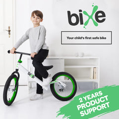 Bixe Balance Bike action image with child learning balance.