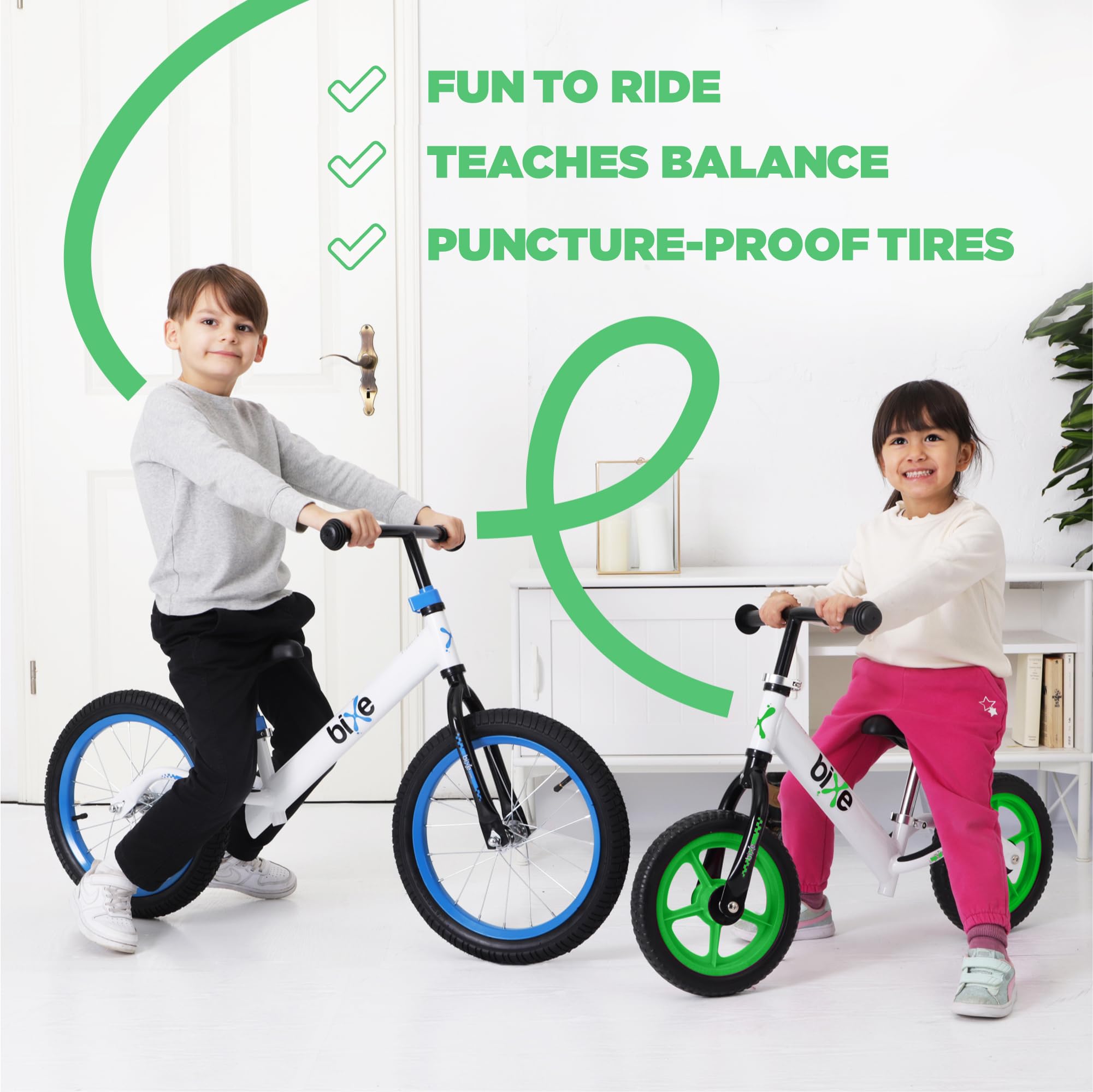 Bixe balance bike green wheels close-up emphasizes durable, washer-equipped wheels
