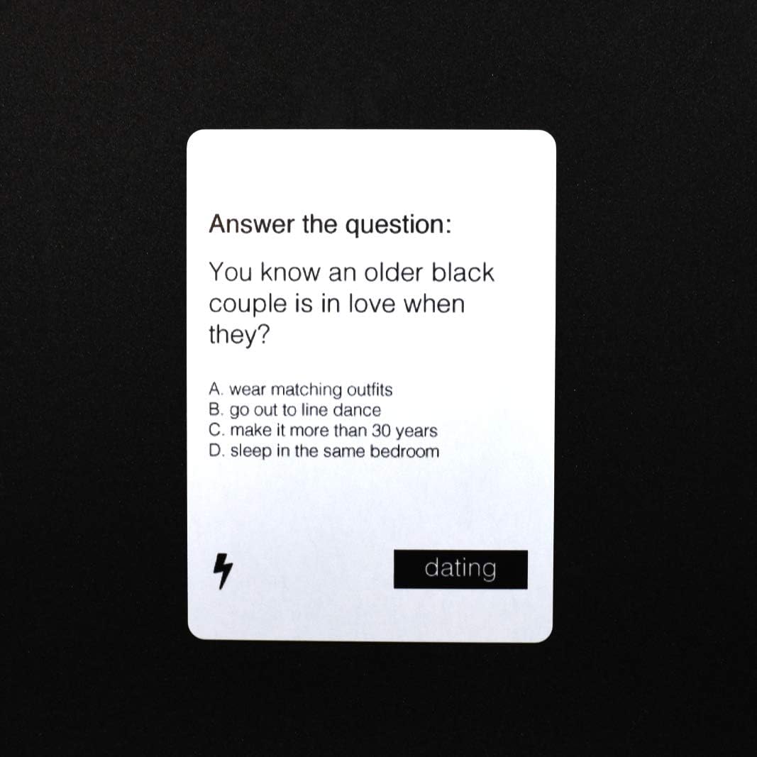  Diverse players enjoying Black Card Revoked Fifth Edition gameplay.