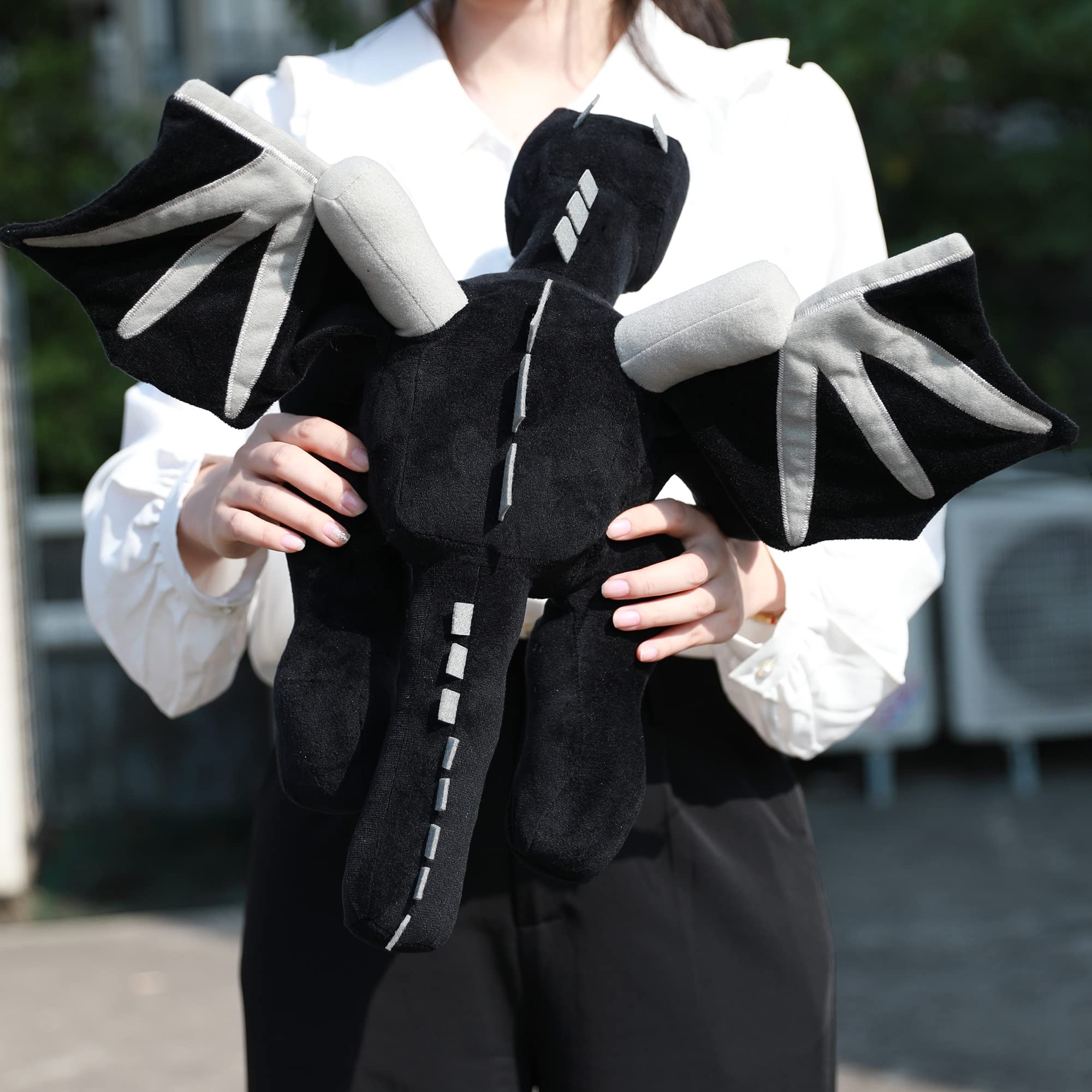 Black Dragon Plush 23.7-inch serves as a cozy nap pillow for kids and fans.