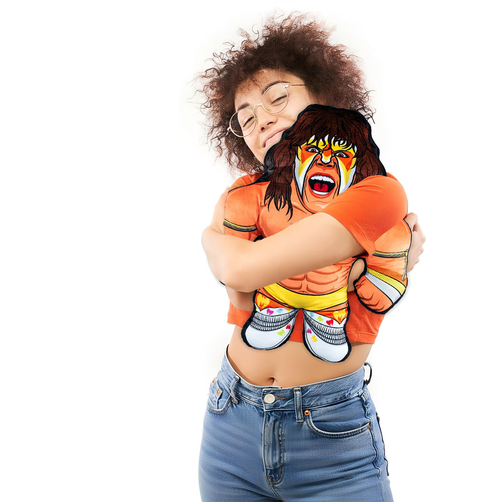 Bleacher Creatures WWE Ultimate Warrior 24-inch Bleacher Buddy, close-up logo, vibrant sublimation print.