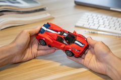 Block Builder Ferrari F8 steering wheel close-up highlights realistic controls.