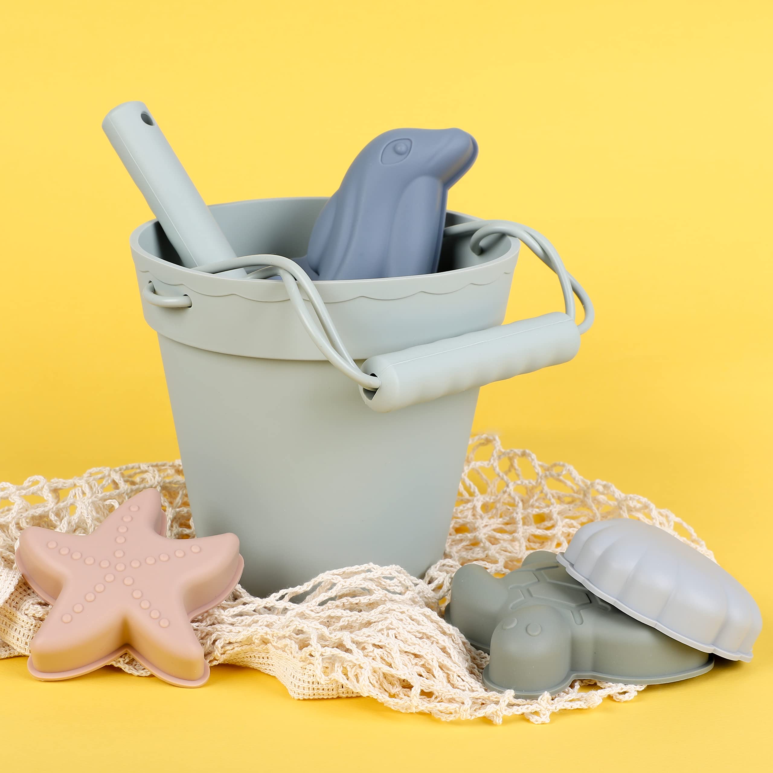 Blue Ginkgo dolphin mold adds imaginative shapes to sea play.