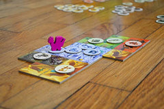 Dragomino exploration dominoes arranged to plan next move.