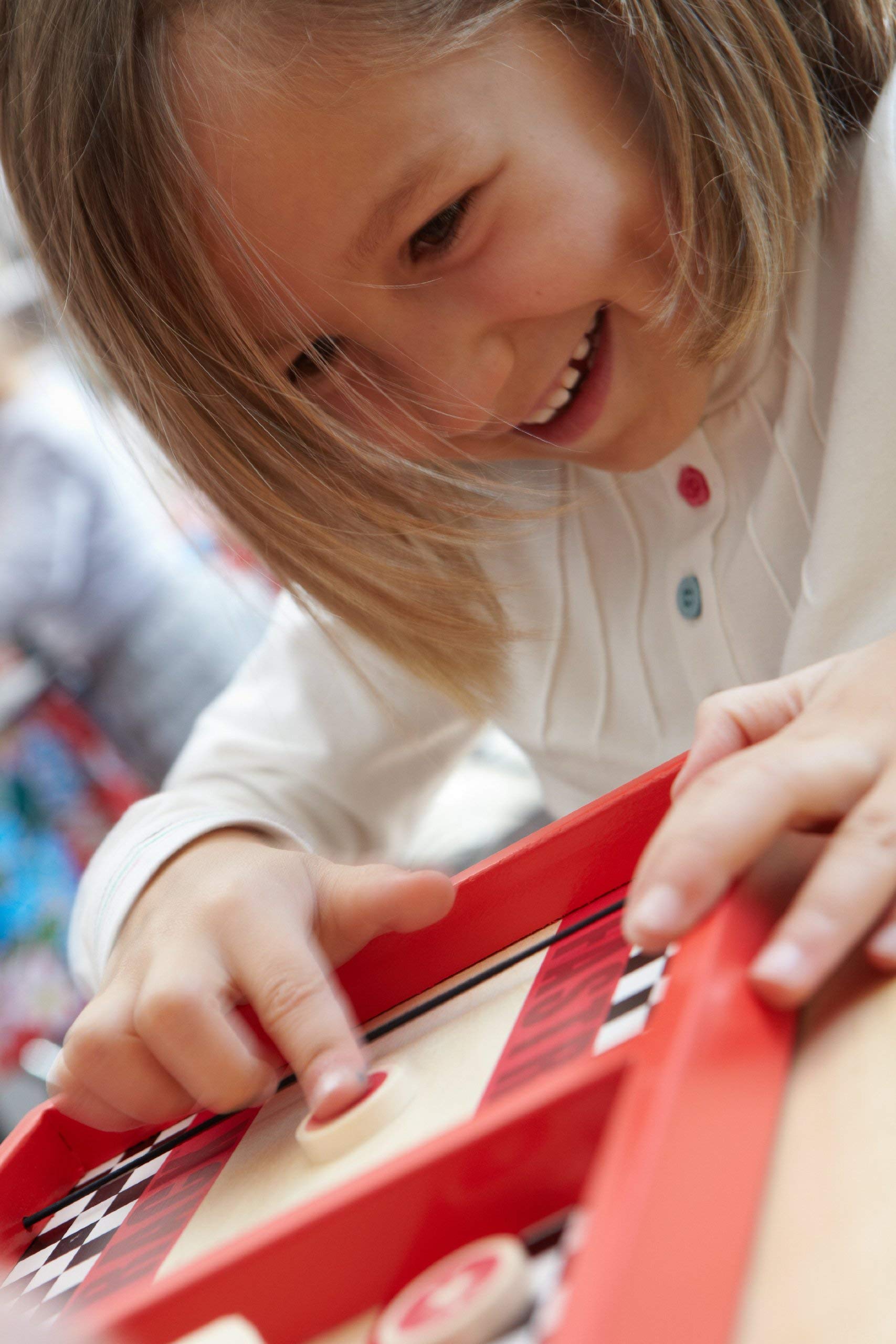 Blue Orange Fastrack elastic cord used to sling discs across the rink
