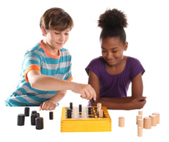 Nestable Gobblet pieces demonstrating stacking and capture.