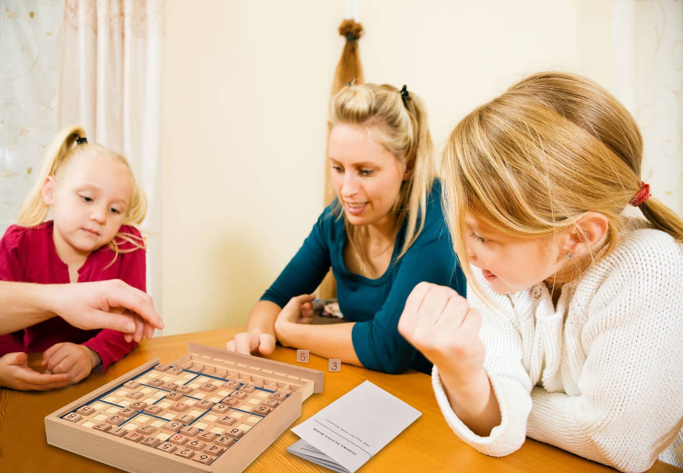BOHS 100-puzzle booklet sits beside the board for varied challenges.