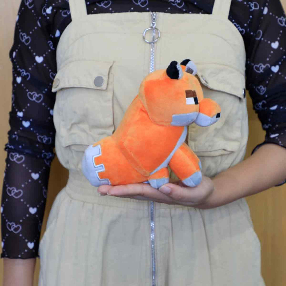 Boonplush Fox plush toy on a shelf, ready to be a cozy decor accent.