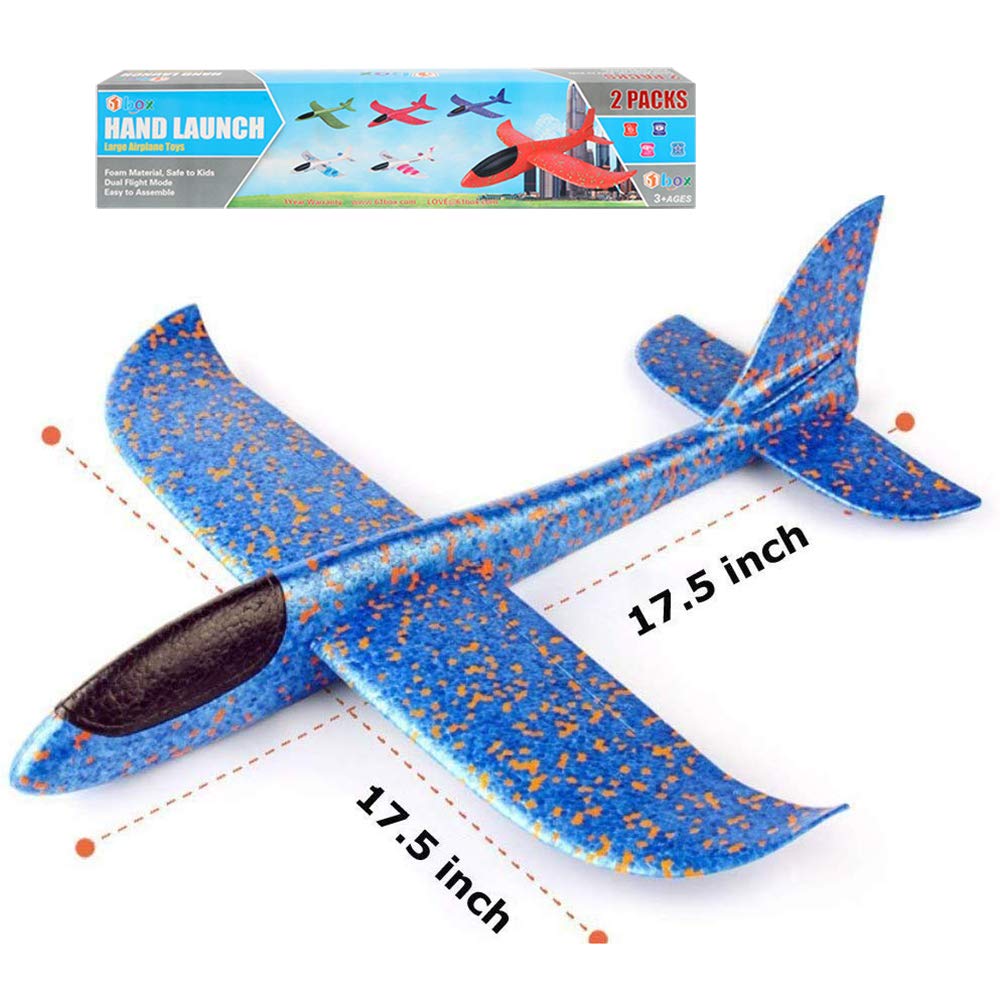 Kids enjoy BooTaa planes during outdoor family playtime.