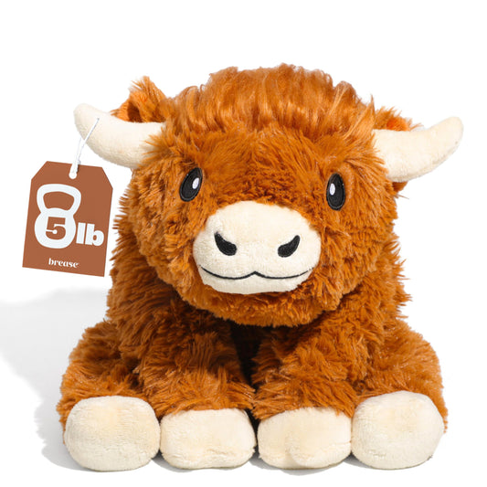 Brease weighted Highland Cow plush in full view; a comforting hug for all ages.