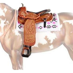 Hand-painted finish on Cimarron saddle adds collectible realism.