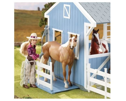 Buckskin Quarter Horse figure in 1:12 scale displayed with the deluxe Breyer stable.