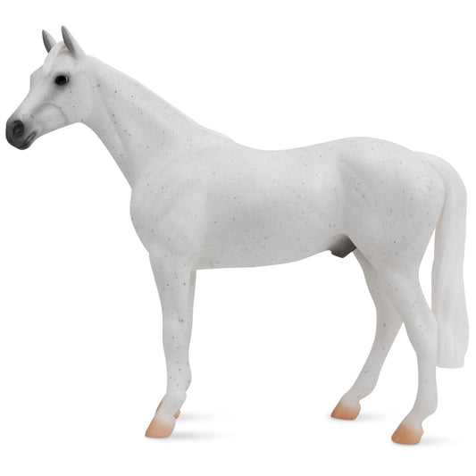 Breyer Freedom Series Fleabitten Grey Thoroughbred figure with hand-painted detail for realistic play and display