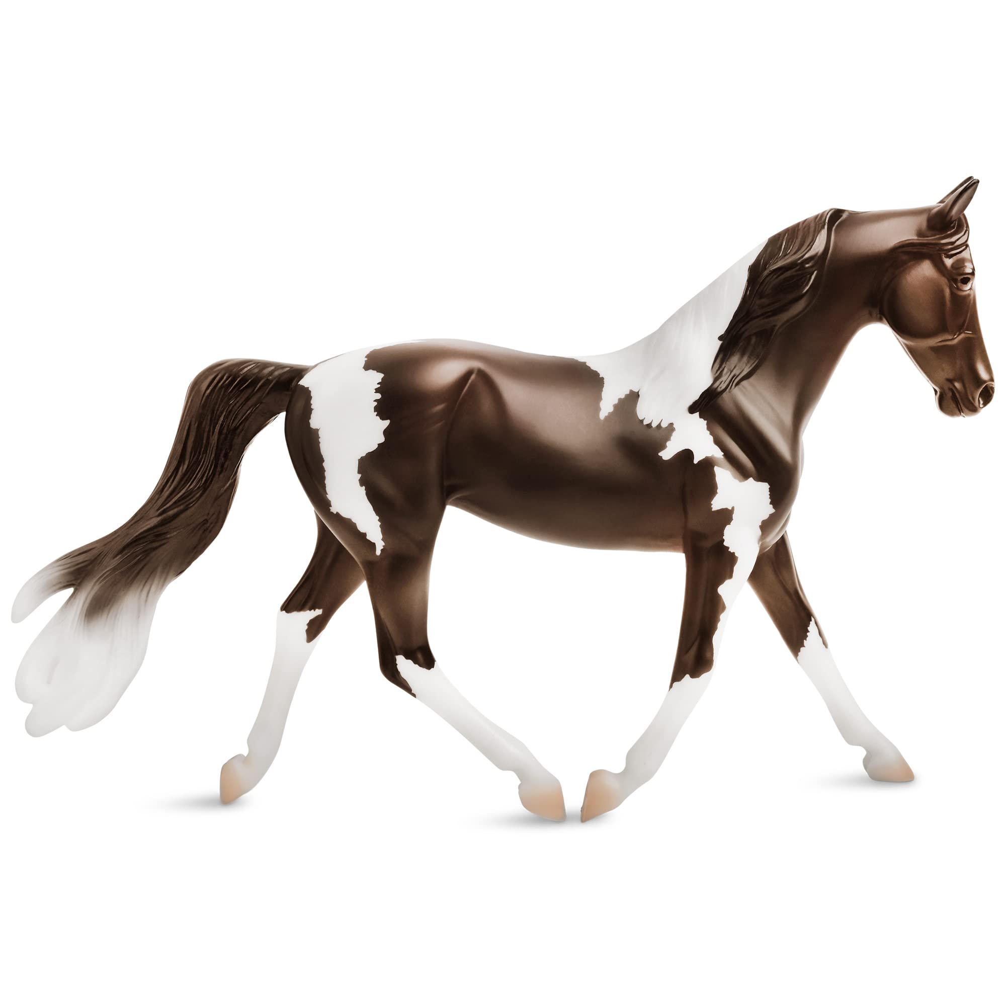 Breyer Freedom Series Pinto model horse with vibrant hand-painted coat for imaginative play.