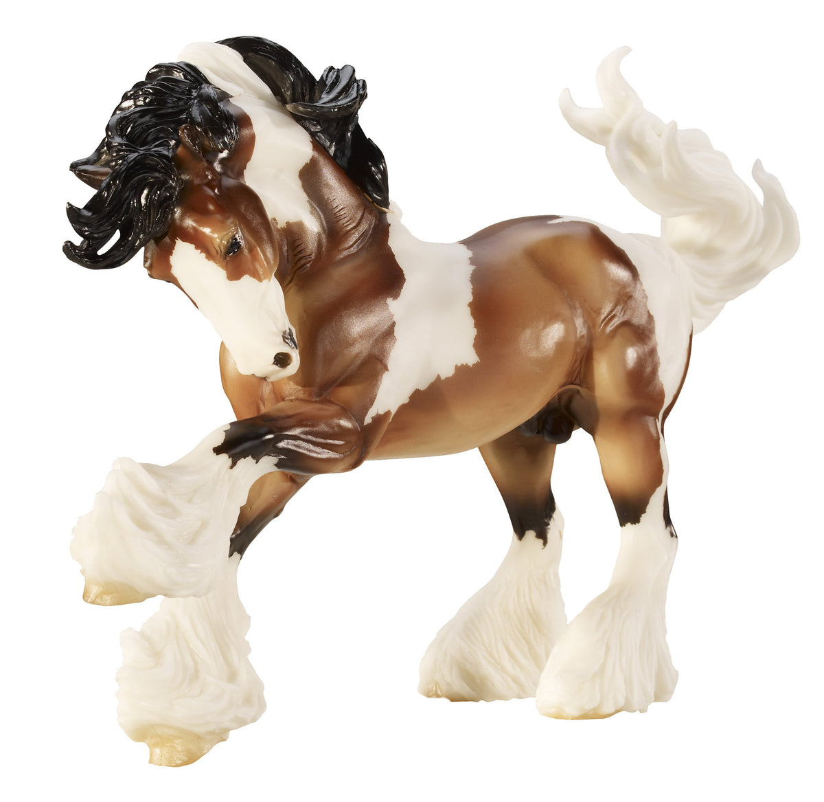 Breyer Gypsy Vanner model in skewbald coat, ideal for display and imaginative play.