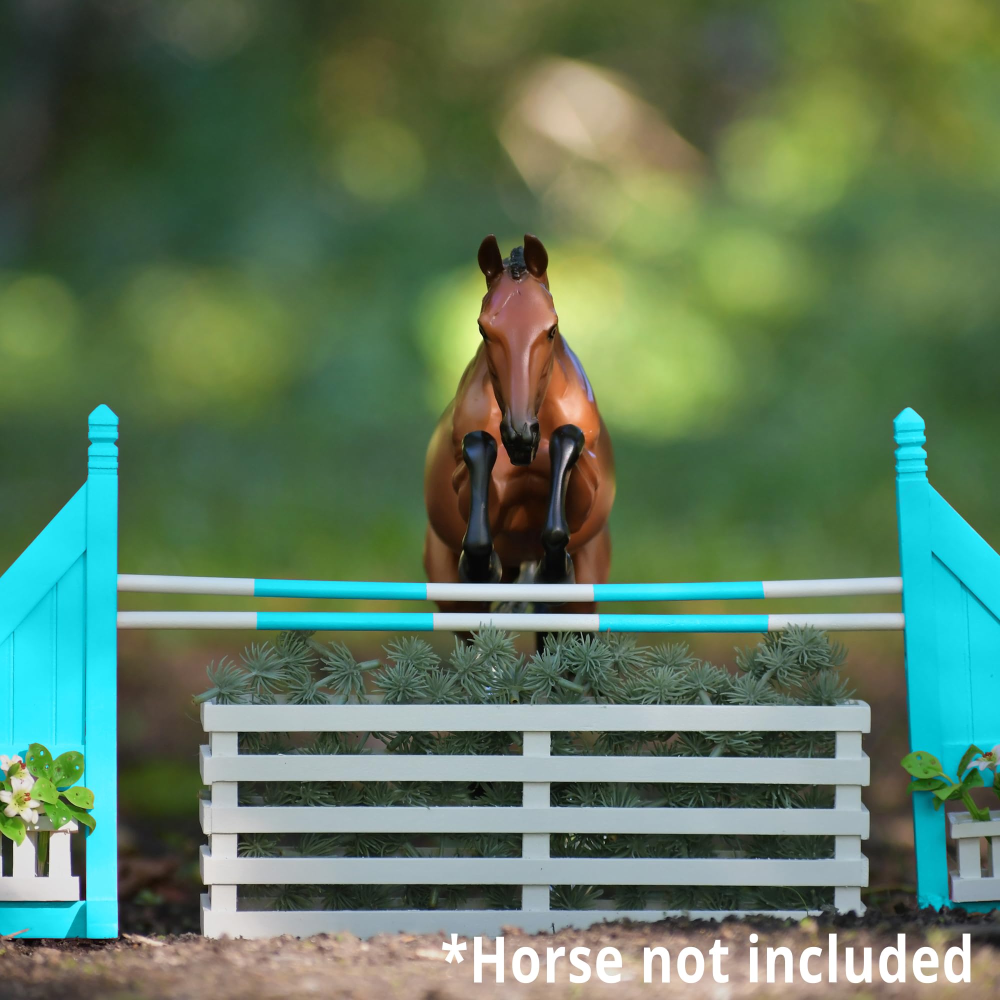 Breyer craftsmanship highlighted by hand-finished details on the wooden jump accessory.