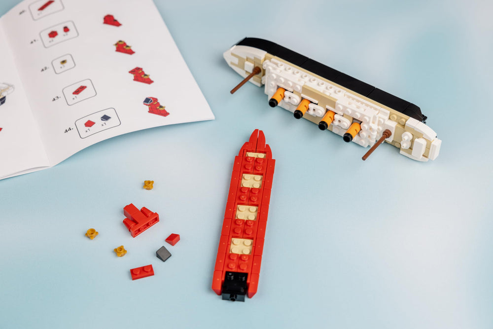 Desk-scene centerpiece: Brick Loot Titanic on a compact display setup.