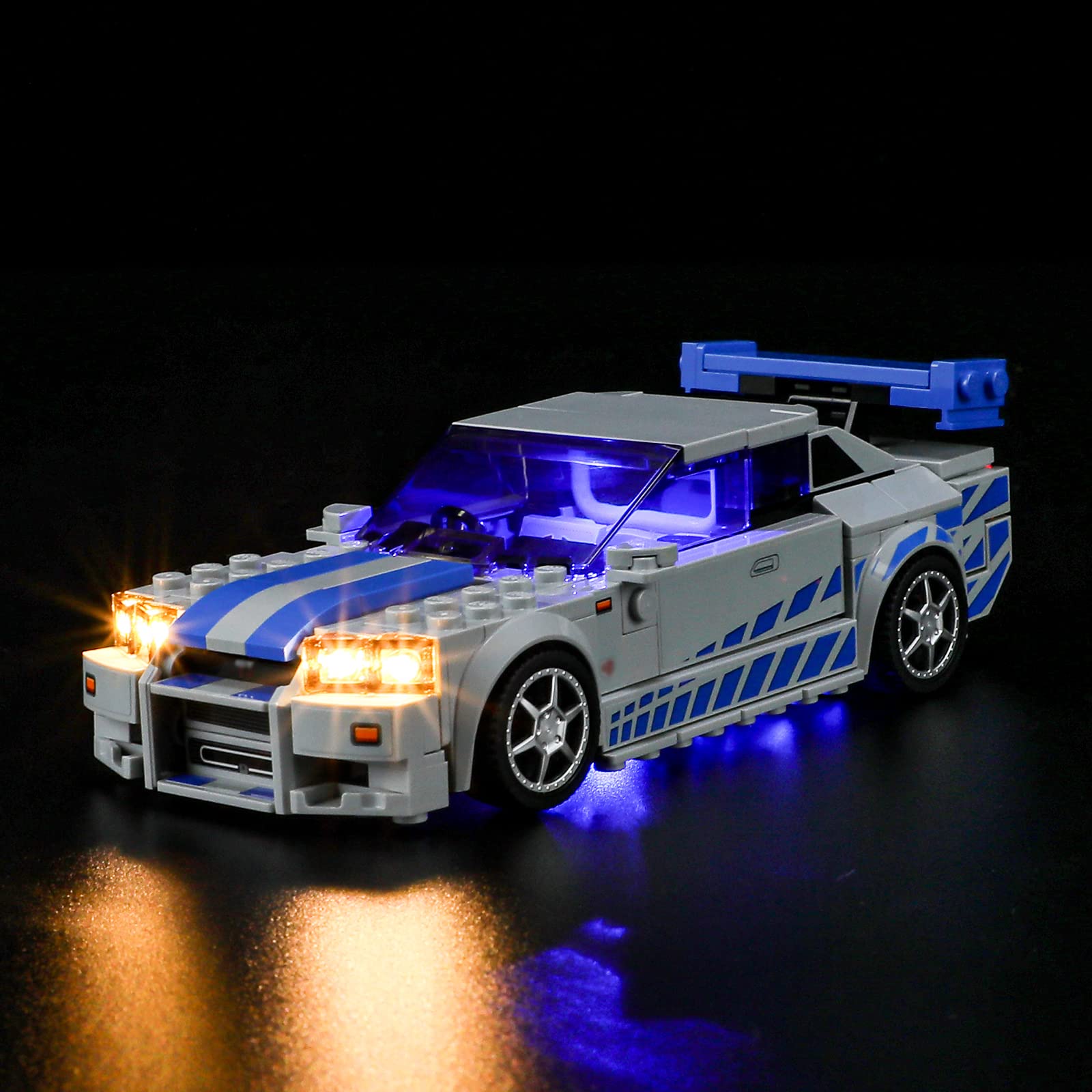 BRIKSMAX LED kit front view enhances LEGO Nissan Skyline R34 with vibrant glow.