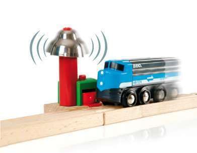 Side view of BRIO Magnetic Bell Signal green; easy to integrate with BRIO sets.