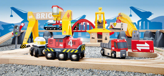 BRIO World Cargo Railway Deluxe cranes in action lifting cargo for pretend logistics.