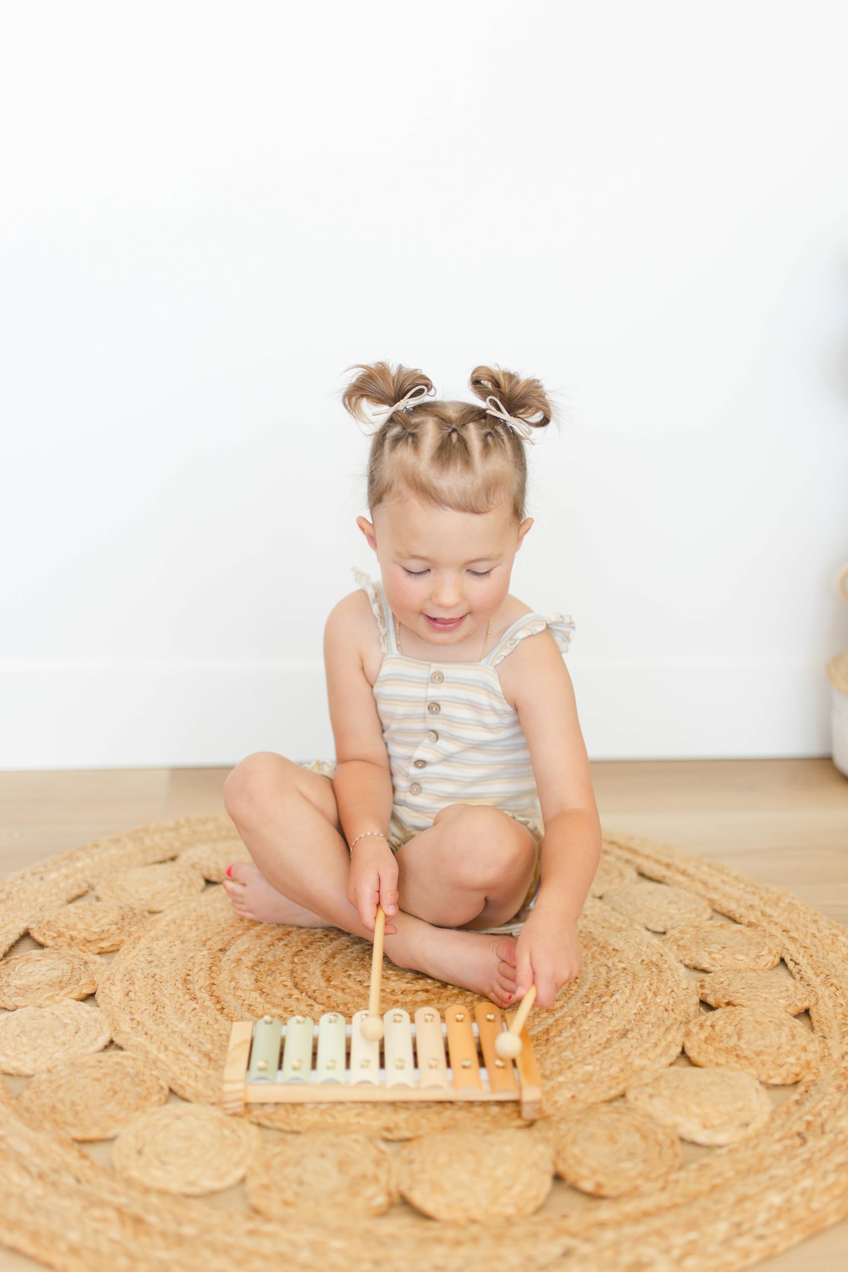 Brooklyn Neutral Xylophone in a nursery with a calm color palette