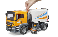 Bruder 03780 Man TGS Street Sweeper suction hose highlights powerful debris pickup.