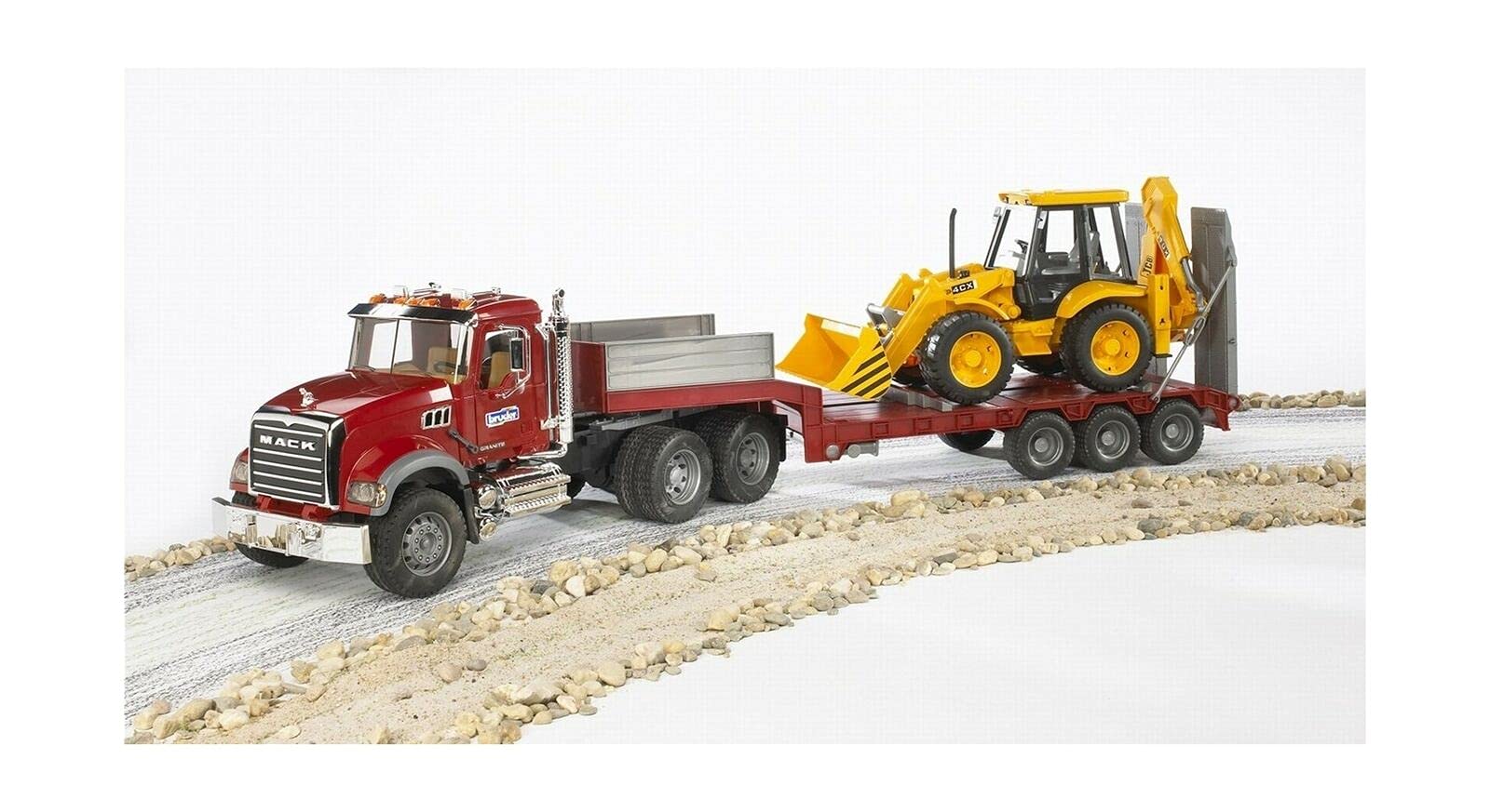 Bruder Mack flatbed truck with detachable trailer for realistic hauling scenarios.