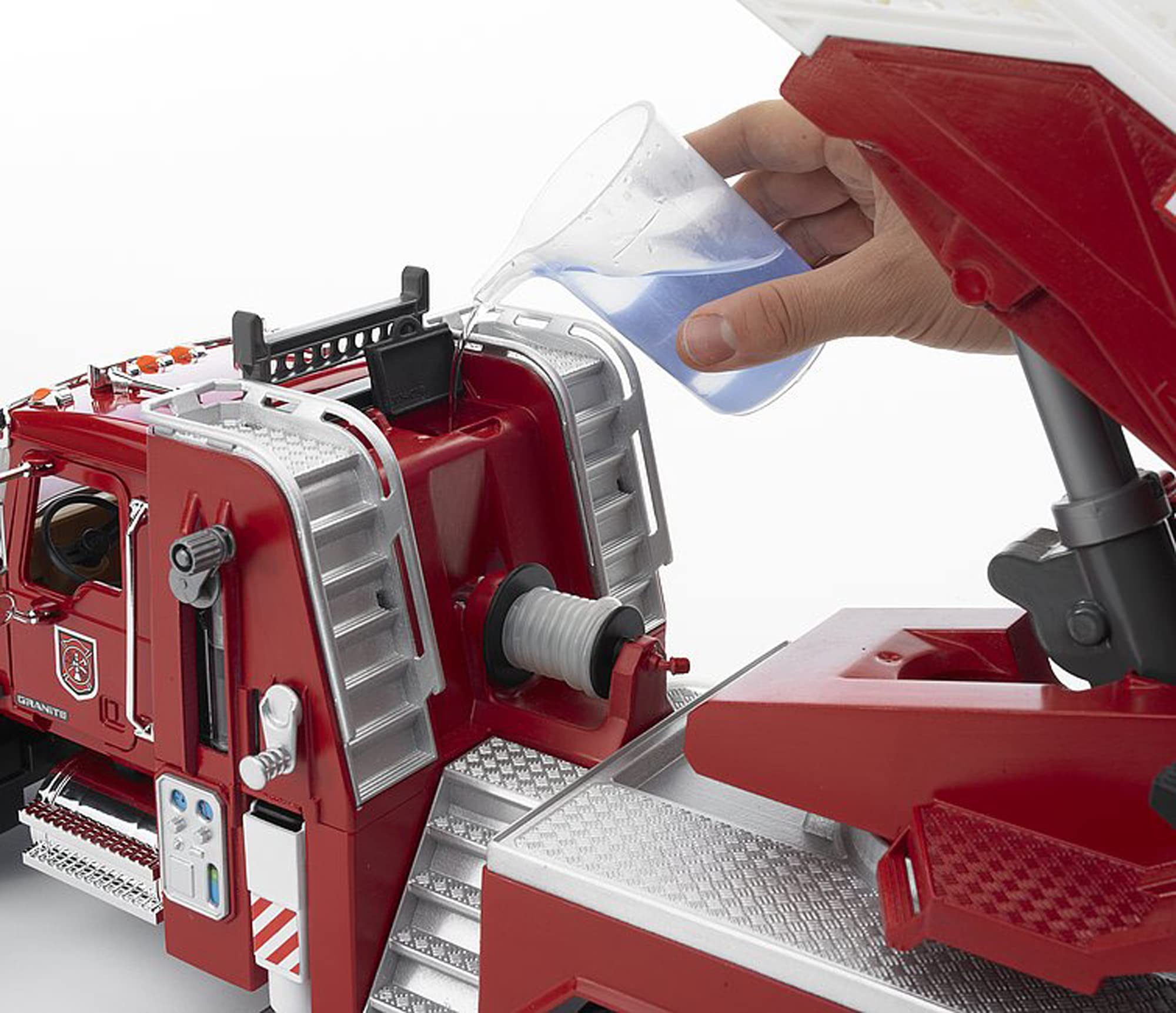 Bruder Mack Granite fire engine opening hood reveals chrome accents