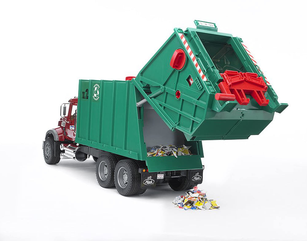 Bruder included colored dustbins for interactive recycling play.