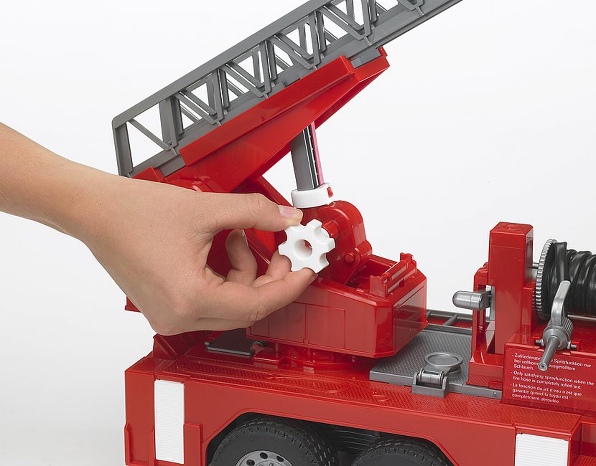Hose sprayer detail on Bruder fire engine for realistic water play