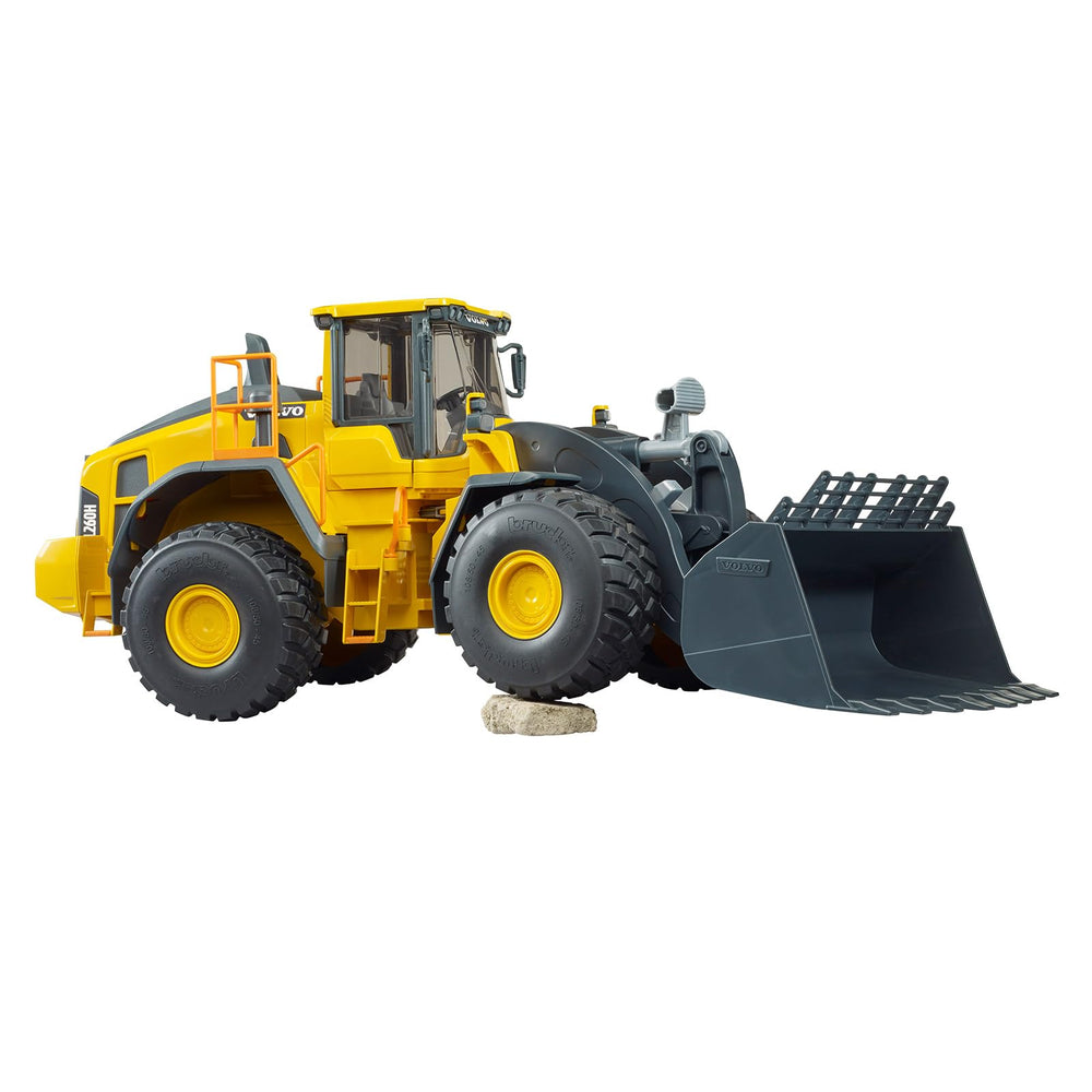 Bruder Volvo L260H tiltable shovel demonstrates versatile digging motion
