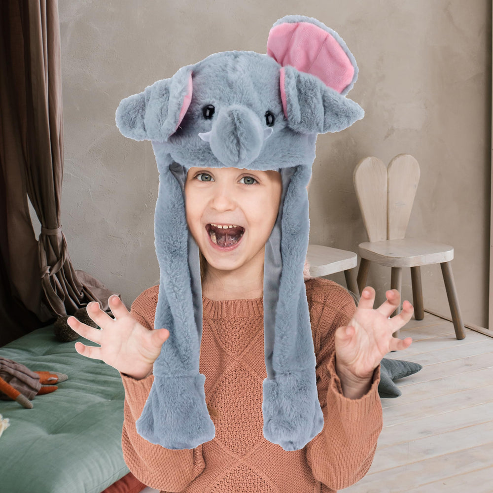 Bubblepompom elephant hat keeps kids warm during outdoor adventures.
