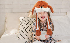 Bubblepompom fox hat in a party scene for photos and fun