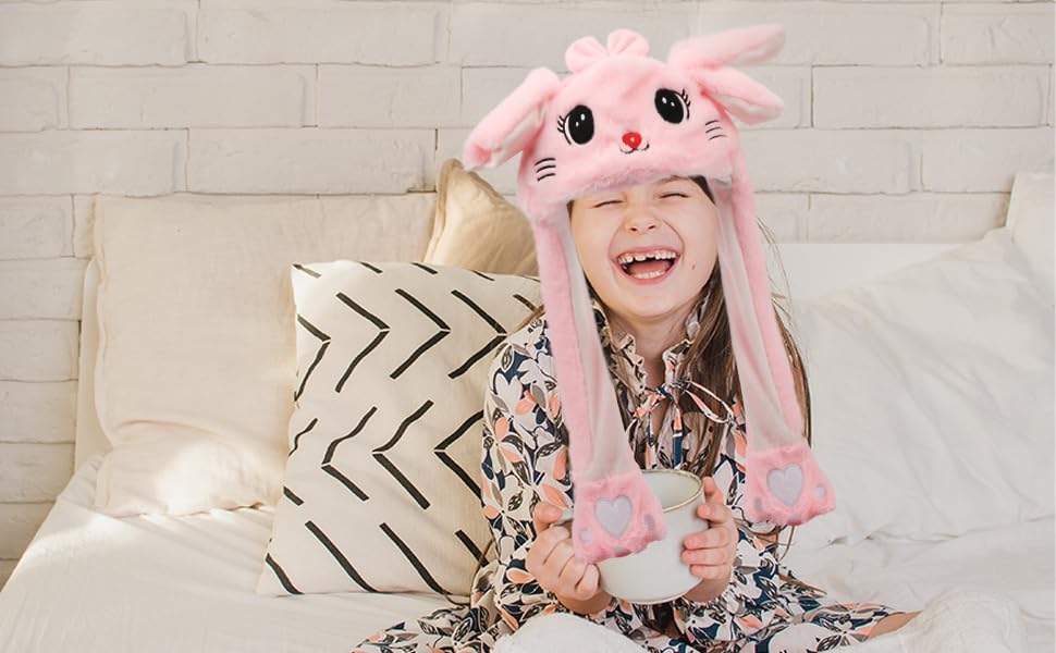 Bubblepompom Pink Cat Hat pairs easily with kids' outfits.