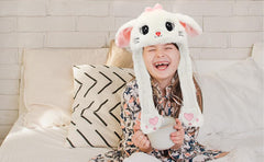Bubblepompom animal hat keeps head warm with fuzzy plush texture.