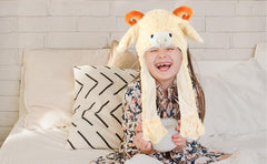 Bubblepompom lamb hat provides warm, soft wear during cold days.
