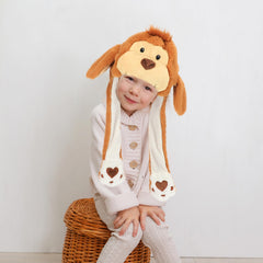 Bubblepompom monkey hat enhances family photos with a fun look