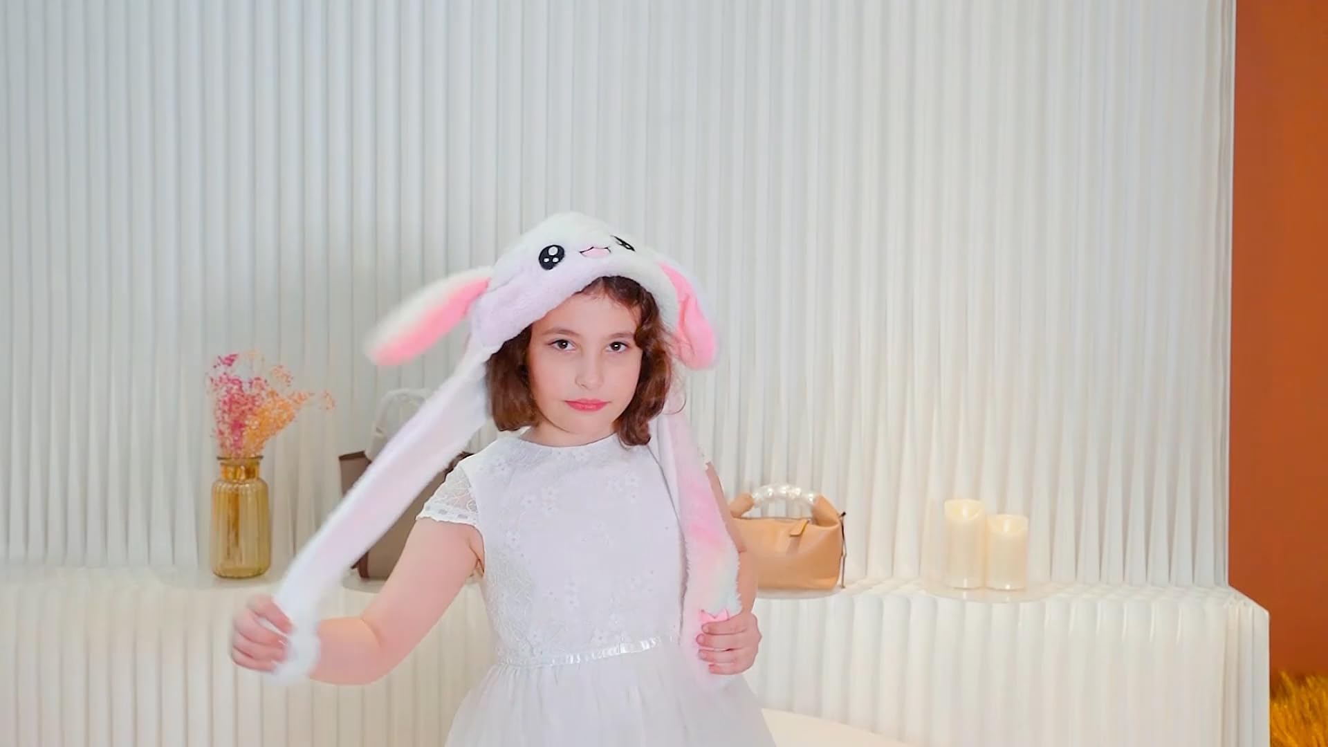 Bubblepompom Rainbow Bunny Hat ideal for cosplay and festive events.