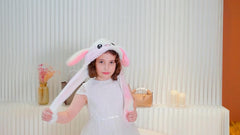 Bubblepompom Rainbow Bunny Hat ideal for cosplay and festive events.