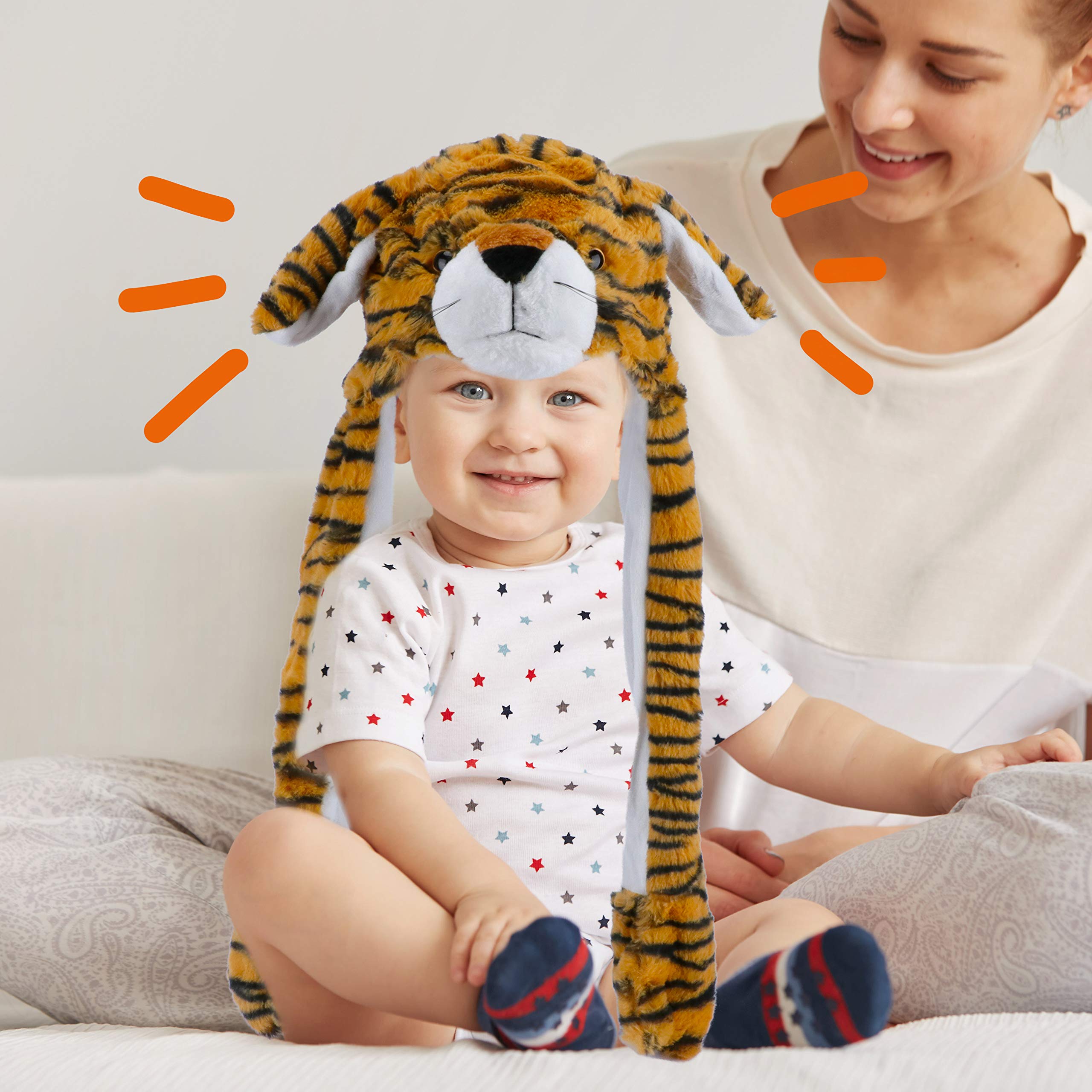 Bubblepompom tiger hat ears moving from side view for interactive play.