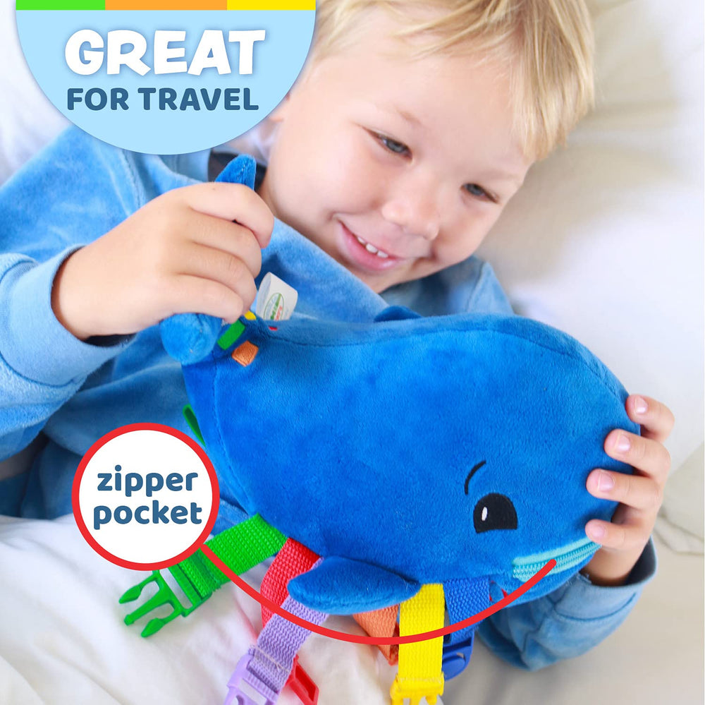 Soft plush Blu Whale serves as a comforting travel companion for curious kids.