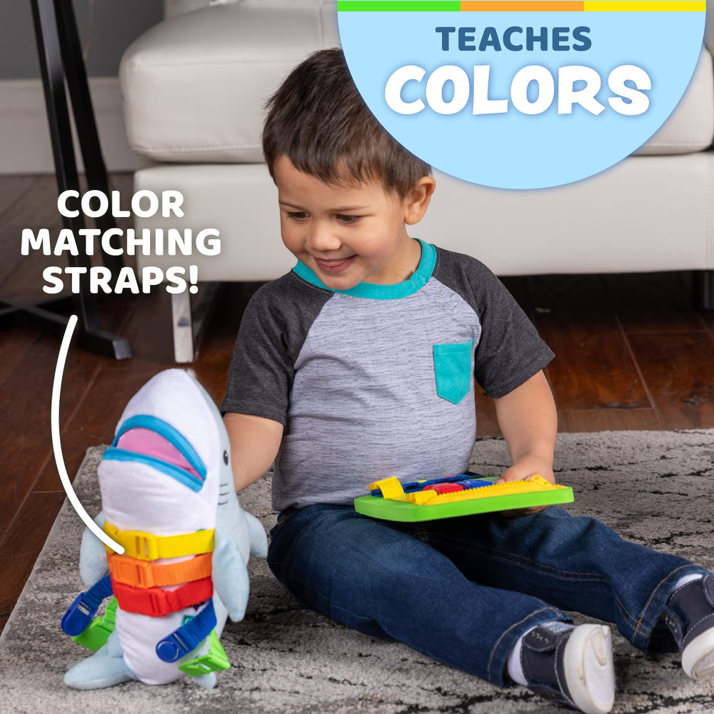 Embroidery of numbers and shapes on Bruce Shark enhances early recognition.